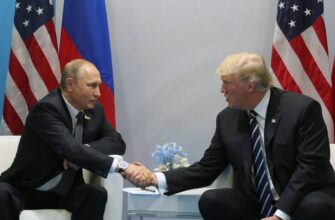 Путин и Трамп пожи мают друг другу руки